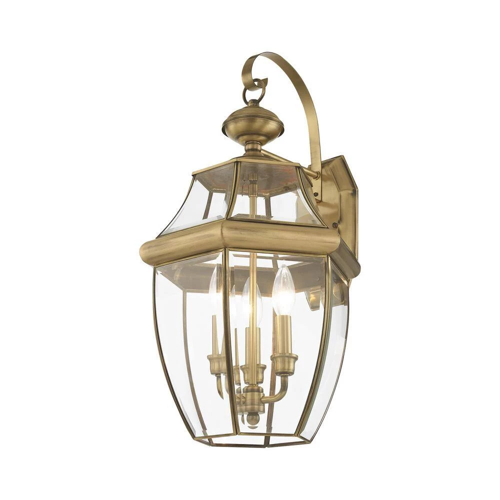 Monterey 3-Light Antique Brass Hardwired Outdoor Wall Lantern Sconce by Livex Lighting 5 Monterey 3-Light Antique Brass Hardwired Outdoor Wall Lantern Sconce by Livex Lighting - Image 5