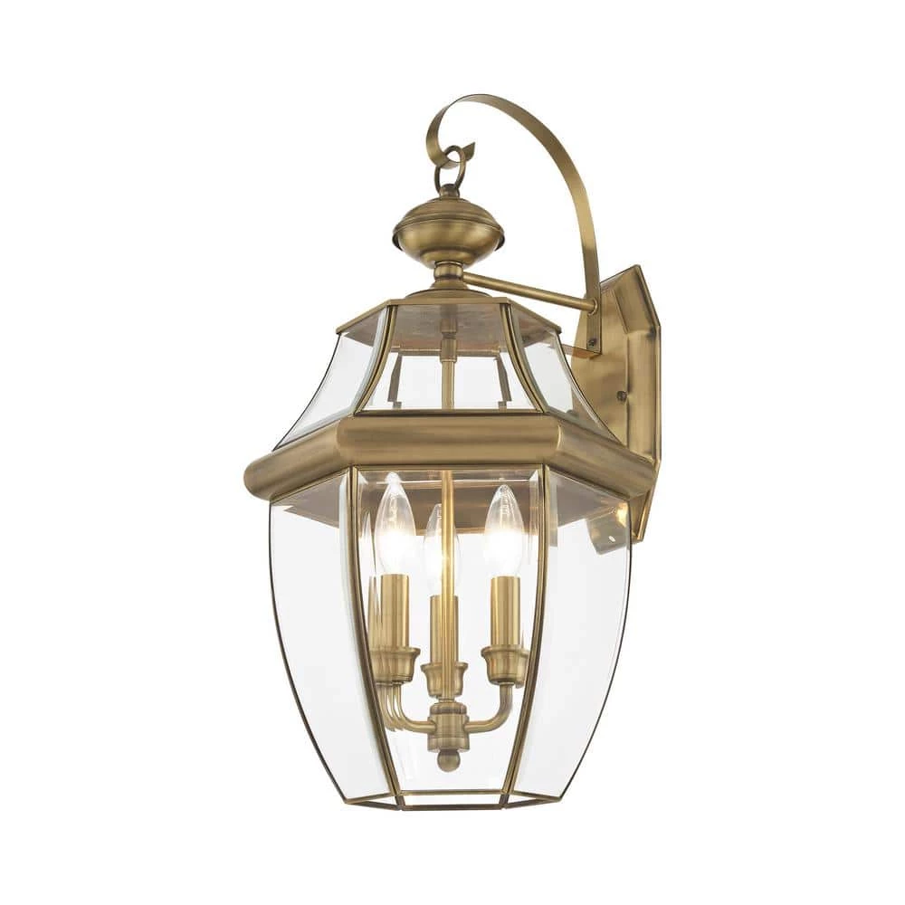 Monterey 3-Light Antique Brass Hardwired Outdoor Wall Lantern Sconce by Livex Lighting 1 Monterey 3-Light Antique Brass Hardwired Outdoor Wall Lantern Sconce by Livex Lighting